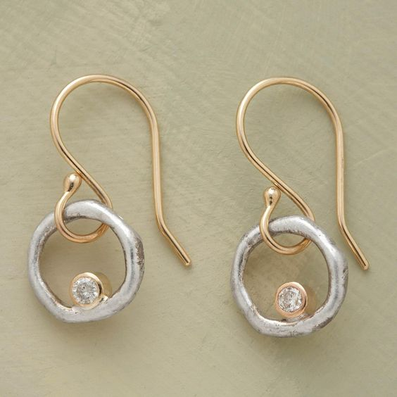 Boucles d'oreilles vintage en or et argent avec zircons